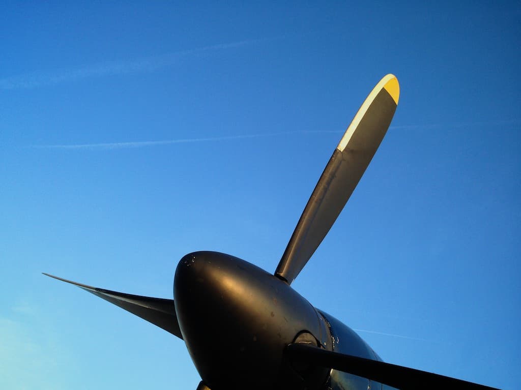 I rode in a small pond hopper this morning. The gigantic propellers looked beautiful against the deep blue morning sky.